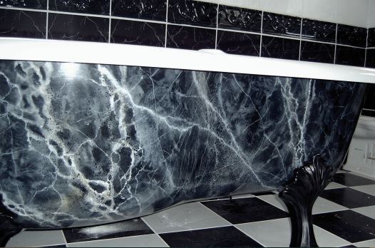 An acrylic bath - marbleized using oil-based paints