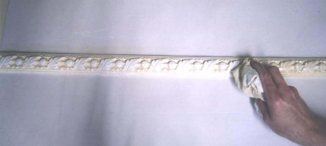 Wiping Back - an ornate plaster dado rail
