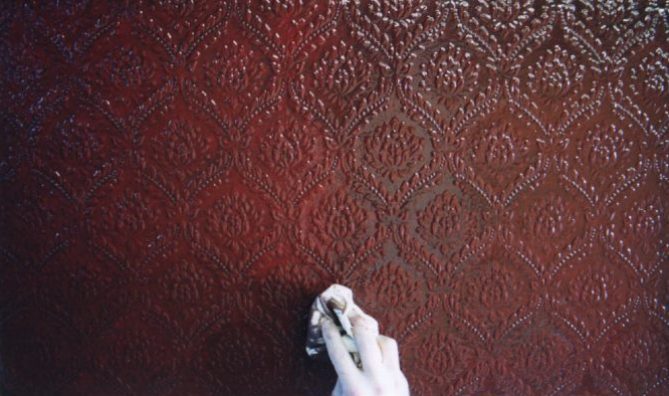 Wiping Back - embossed wallpaper